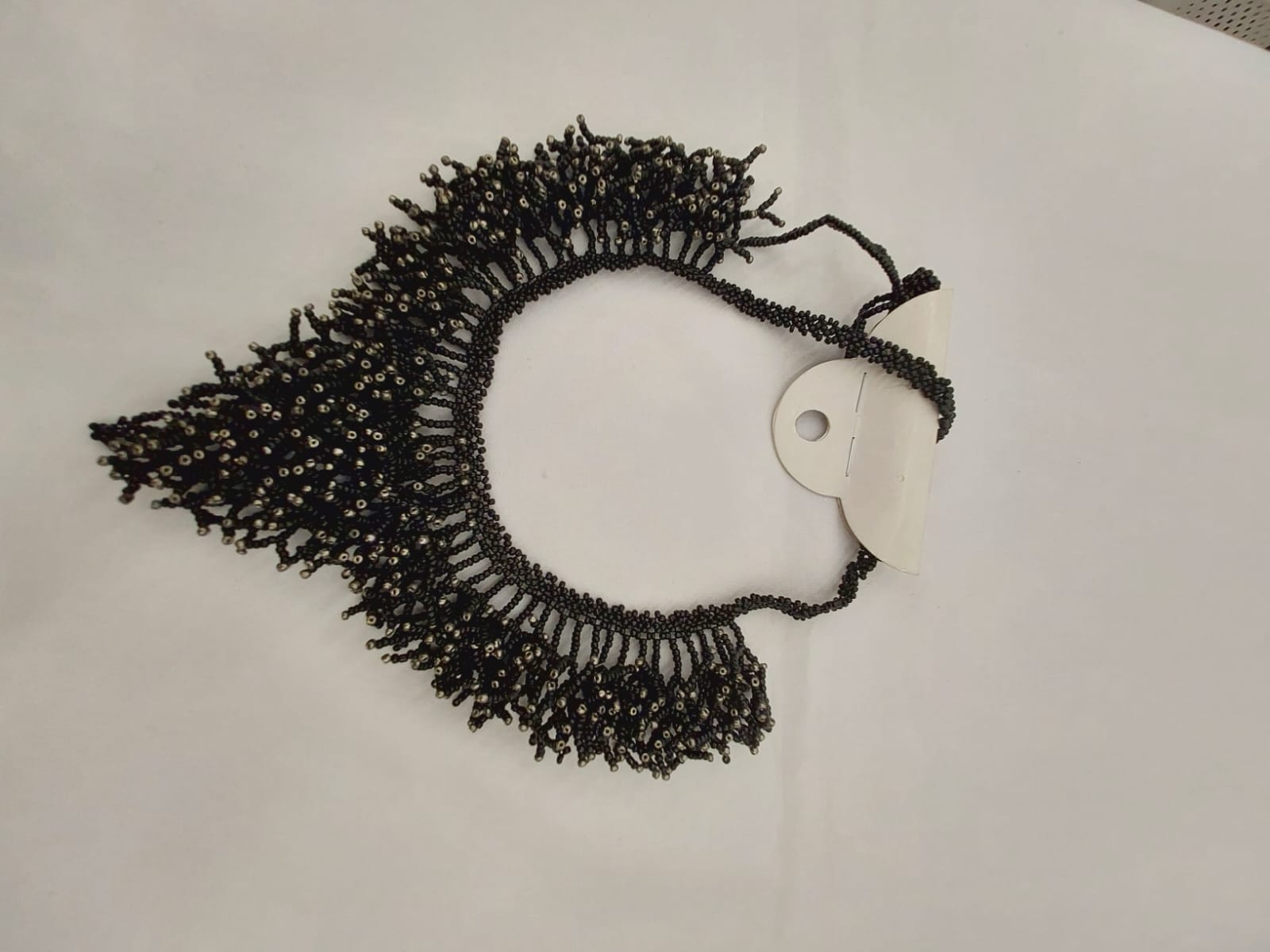 Bijuteria feita à mão em detalhe